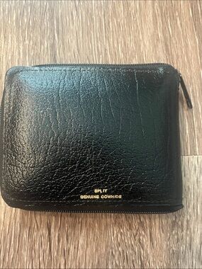 split Black Leather Zip-Around Wallet with Gold Accents